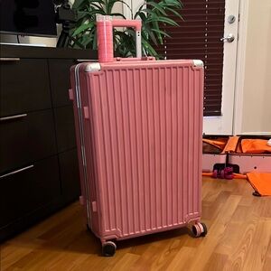 AnyZip Pink No-Zip Hardshell Travel Swivel Trunk